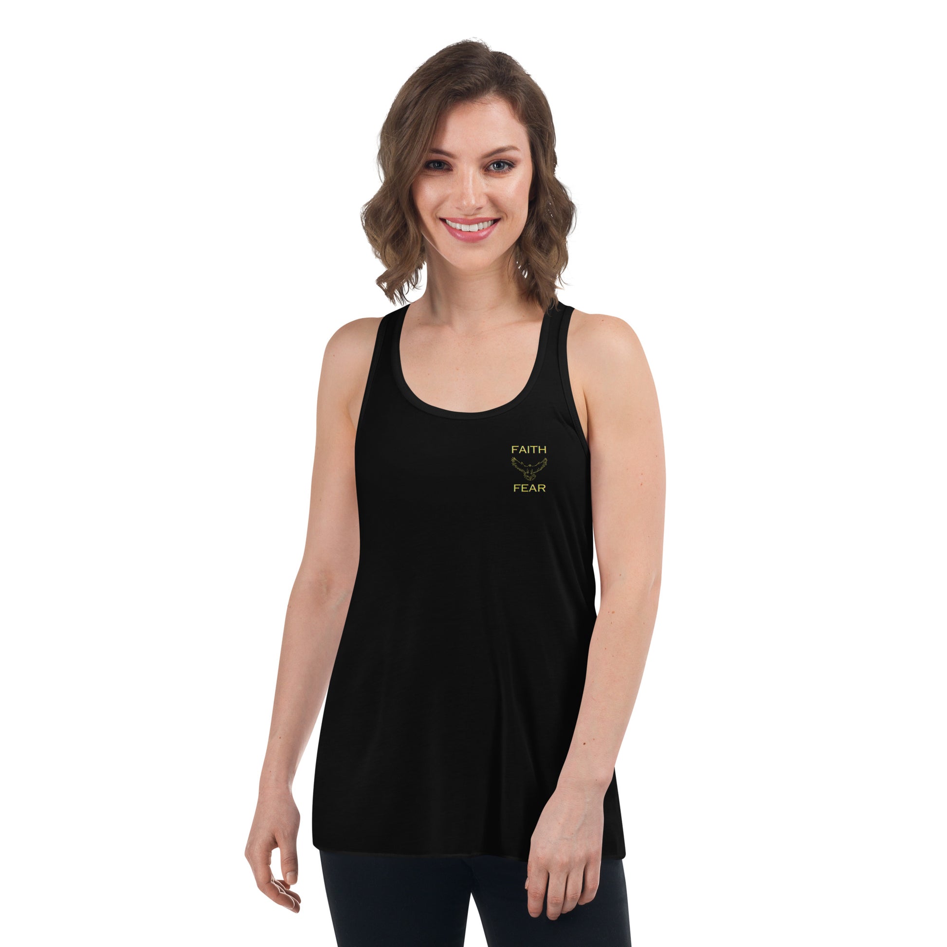 A model showcasing the front of the "Faith/Fear" women's flowy racerback tank